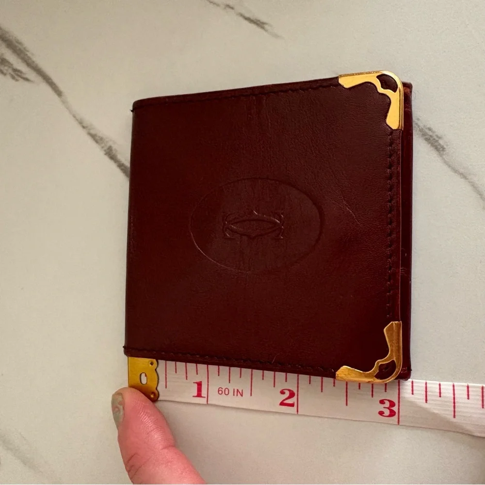 CARTIER Burgundy Leather Coin Wallet with Gold Accents